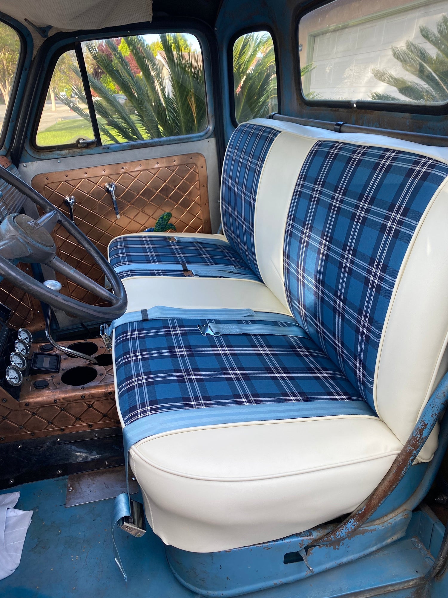 Plaid bench seat upholstery pattern with vinyl bolster pairing